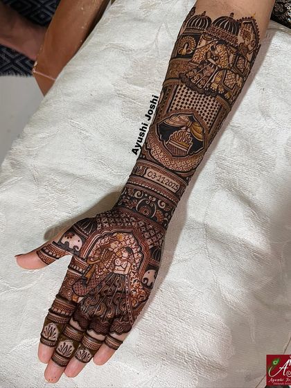 A side view of the full arm, showing how all the different wedding elements and portraits come together in one cohesive design.