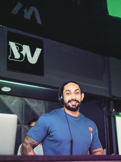 A happy moment behind the decks at Club BW. Loving what you do is the key to doing it well.