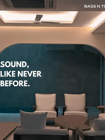 Sound that transforms a space. This pool-side lounge becomes a cinema with compact, high-performance speakers that deliver an immersive experience without being intrusive.