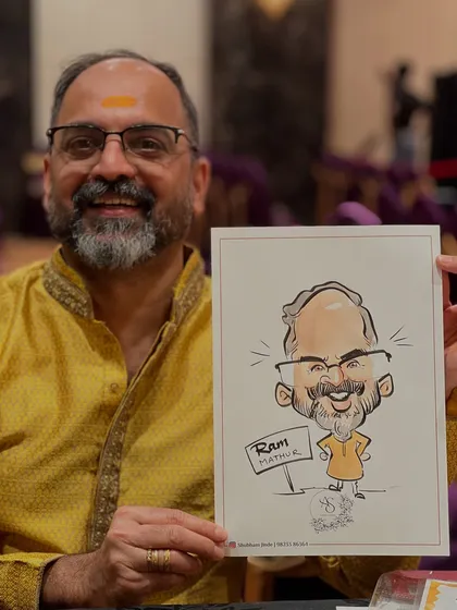 This gentleman's warm smile and traditional attire made for a fantastic caricature subject at an engagement party.