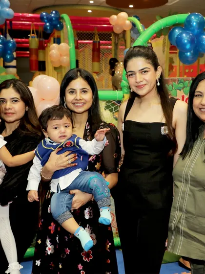 A group of moms and their little ones enjoying the Cinderella-themed party. I create an environment where parents can relax and socialize too.