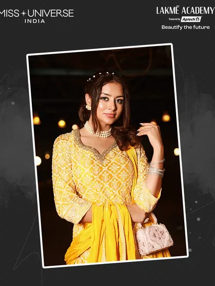 A bright and beautiful yellow outfit paired with delicate pearl accessories and flawless makeup. My students are trained to enhance a client's features while complementing their attire.