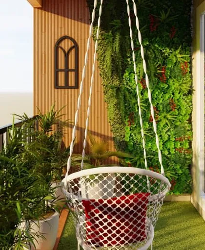 This view shows the combination of a vertical green wall and potted plants to create a lush, layered look. Even in a small balcony, you can feel surrounded by nature.