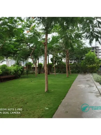 This is a view of a podium garden we maintain on the 5th floor of a residential complex. Our large-scale landscape upkeep includes professional lawn care, tree maintenance, and ensuring the entire space is a clean and peaceful retreat for residents.