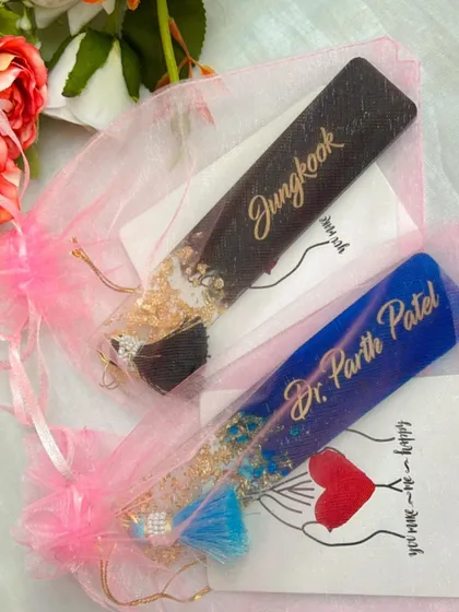 Two personalized bookmarks, each packaged in a delicate organza bag. They make for a beautiful and practical gift for friends, family, or yourself.