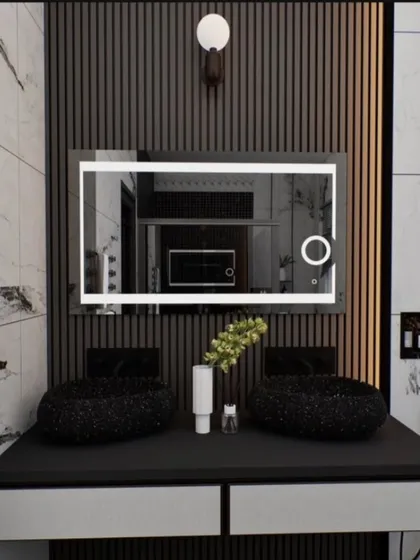 A wide, landscape-oriented LED mirror designed for a double vanity setup. The bright, frame-lit illumination is ideal for larger bathrooms, providing ample light for two people. This model also includes a touch sensor and can be equipped with anti-fog technology.