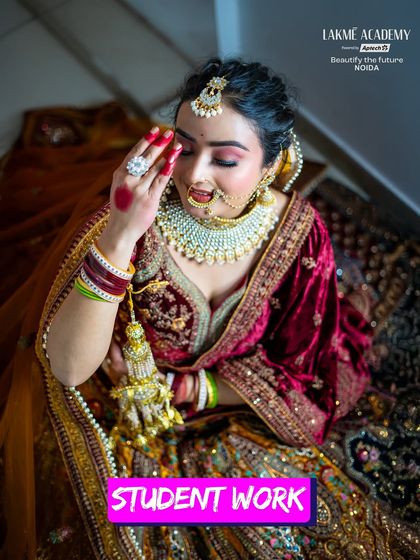 A beautiful student portfolio piece, this image shows a bride in a rich velvet lehenga, a testament to the high-quality training our students receive.