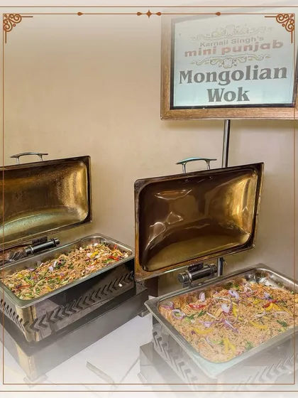 Our Mongolian Wok station offers a sizzling live cooking experience. Guests can choose their own vegetables and sauces to create a personalized stir-fry.