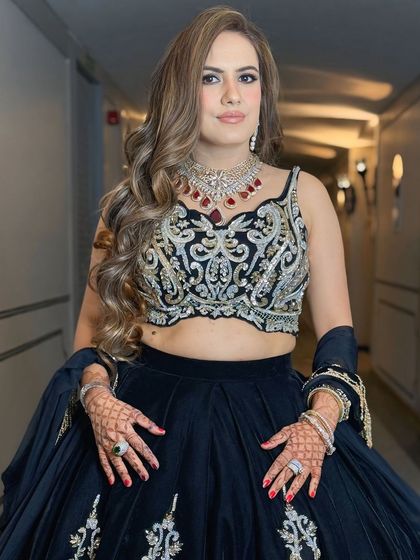 A close-up of the makeup, showing the smokey eye and the perfectly defined features.