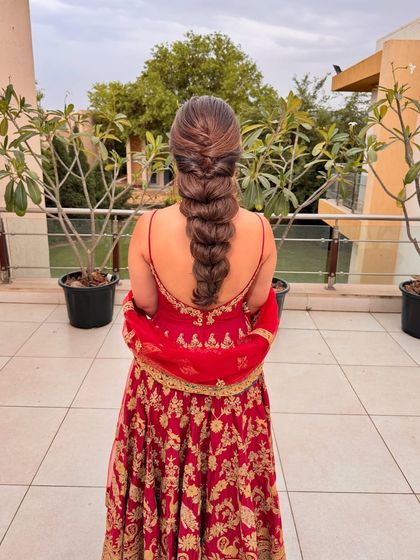 A real-life fairy. This look features a beautiful, intricate braid and soft, glam makeup that is perfect for a Mehendi or Sangeet.