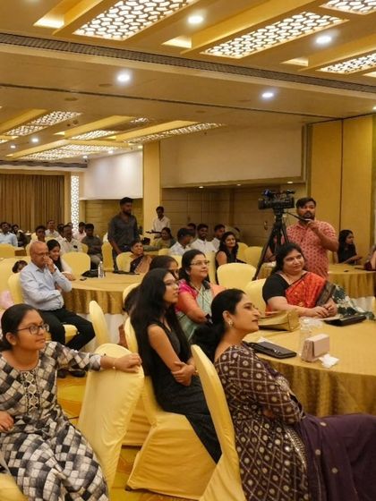 A shot of the audience during one of my corporate mentalism shows. You can see the focus and curiosity on their faces. Keeping a professional audience captivated is a skill I have honed over many events.