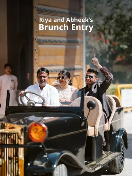 Your story is unique, and your entrance should be too. For this couple's brunch, we arranged a grand arrival in a vintage automobile, creating a joyful and stylish moment that set a celebratory tone for the rest of the day's festivities.