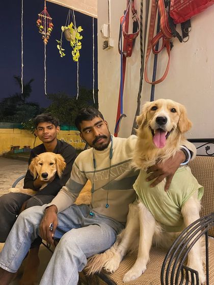 Puchi the Golden Retriever enjoying some quiet time with our staff. We provide a balance of active play and calm relaxation.
