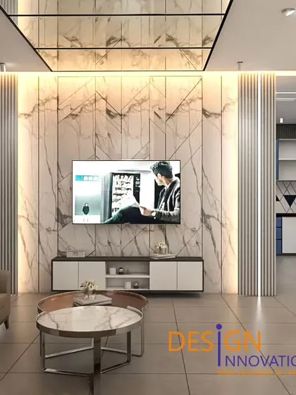 This living area demonstrates our expertise in using luxurious materials to create a high-end feel. A floor-to-ceiling marble panel serves as the focal point, complemented by sleek furniture and carefully planned architectural lighting for a clean, contemporary look.