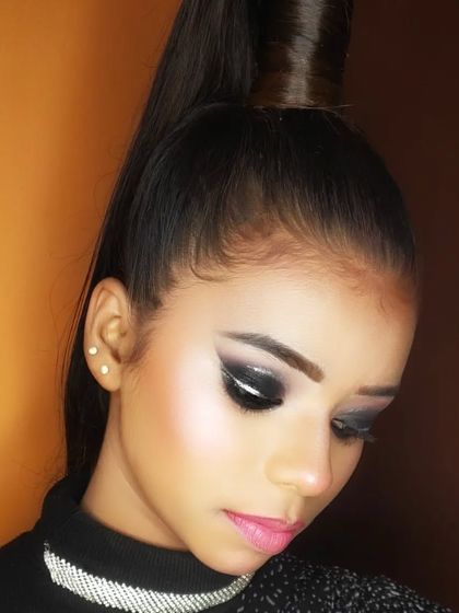 Another angle of the graphic smokey eye, paired with a sleek high ponytail.
