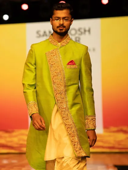 A closer look at the intricate embroidery on the lime green sherwani during the Mysore Fashion Week show.