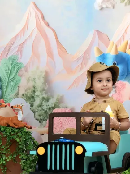 This wide shot shows our little adventurer on a dinosaur safari, with mountains and lush foliage creating a perfect prehistoric scene.