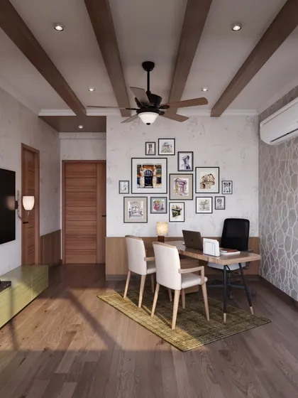 Another view of the study shows the wooden ceiling beams and a personal gallery wall of family photos. These details add warmth and character, making the workspace feel both professional and deeply personal.