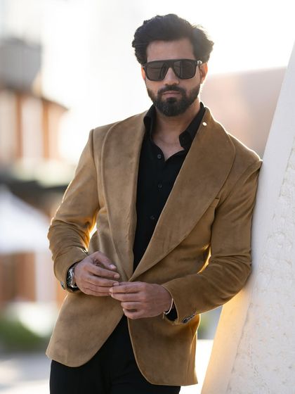 Introducing our mustard velvet blazer. The rich texture and unique color make this a standout piece for evening events.