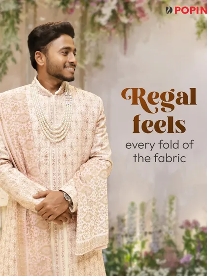 You can feel the quality in every fold of the fabric. This is a close-up of one of my premium sherwanis, showing the detailed embroidery and the elegant pearl mala accessory that completes the groom's ensemble.