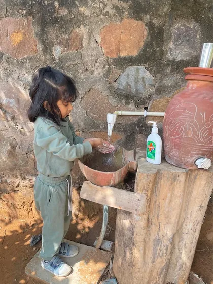 A young participant at our first meet-up demonstrates the importance of handwashing. We strive to create a family-friendly environment where even the youngest members feel involved.
