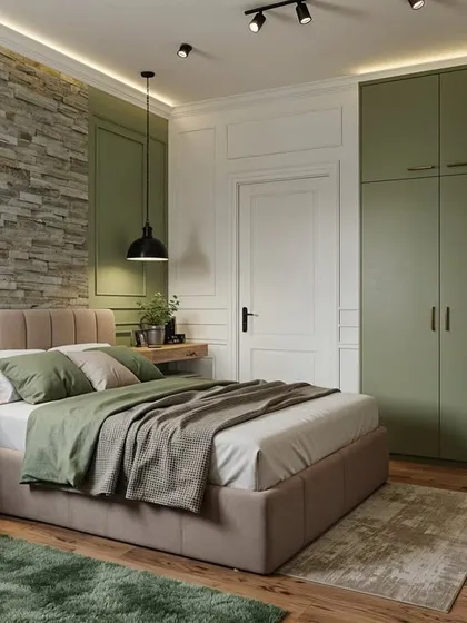 If interiors were cars, this is the "Range Rover" bedroom. A forest-green sanctuary wrapped in wood paneling, it's rugged yet refined.
