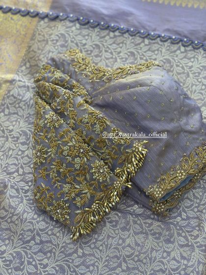 The full layout of the lavender floral blouse.