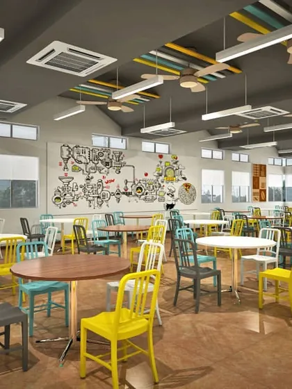 A 3D render of a large, vibrant cafeteria designed for a corporate office. The use of colorful chairs, varied table arrangements, and playful wall art creates a fun and energetic dining space that can accommodate many employees at once.
