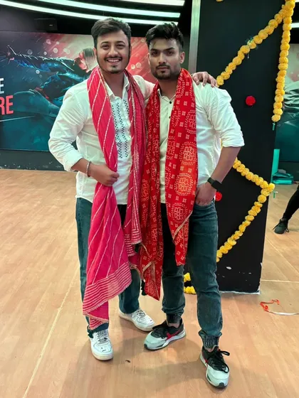 A picture with a friend and fellow dancer, capturing the spirit of our Dandiya events. We bring both personal energy and coordinated style to every celebration.