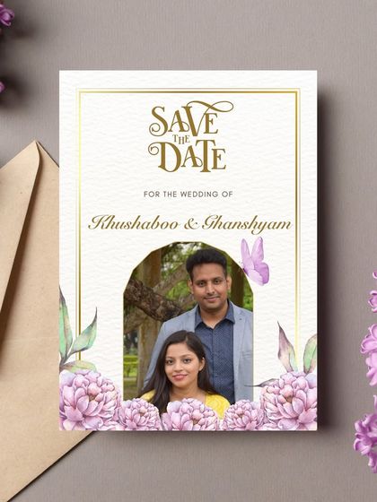 A magnificent and breathtaking Save the Date design. This card features a photo of the couple framed by an arch of beautiful lilac flowers, blending personal touches with modern floral art.