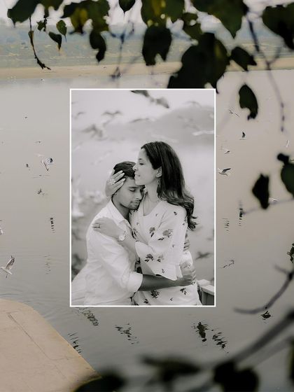 A tender black and white close-up of the couple on the boat. This intimate portrait focuses purely on their connection and emotion.