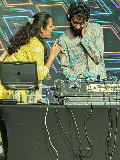 Taking a song request during a corporate event. I'm always happy to tailor the music to the client's needs.