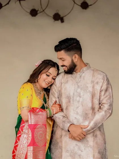The couple sharing a quiet, happy moment together.