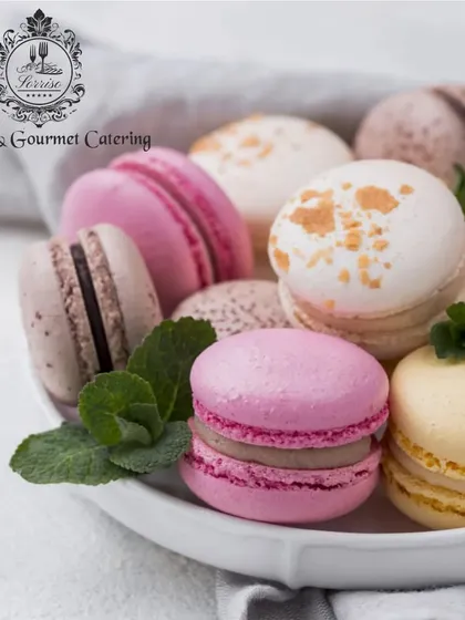 A beautiful assortment of French macarons in various colours and flavours. These delicate almond meringue cookies are a sophisticated addition to any high-tea or dessert table.