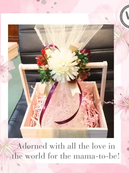 Adorned with all the love in the world for the mama-to-be. This empty basket shows the beautiful presentation, ready to be filled with custom gifts.