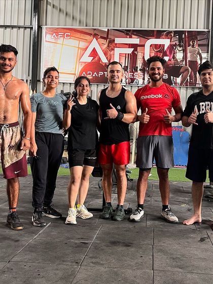 Sweat, smiles, and support. That's the formula for success here at Adapt Fitness Club.
