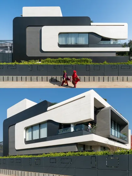 For Residence 100, I created a distinctive facade using interlocking oblong shapes in a black and white palette. This design element sets the home apart and flows from the exterior through to the interior spaces.
