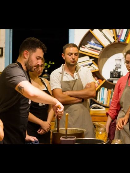 Our chef explaining the intricacies of Indian spices and cooking techniques. We love sharing the stories behind the food, making it a rich cultural and educational experience.