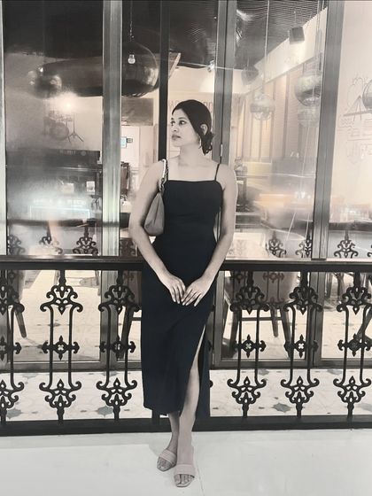 A black and white version of the look, highlighting the timeless silhouette of the slip dress.