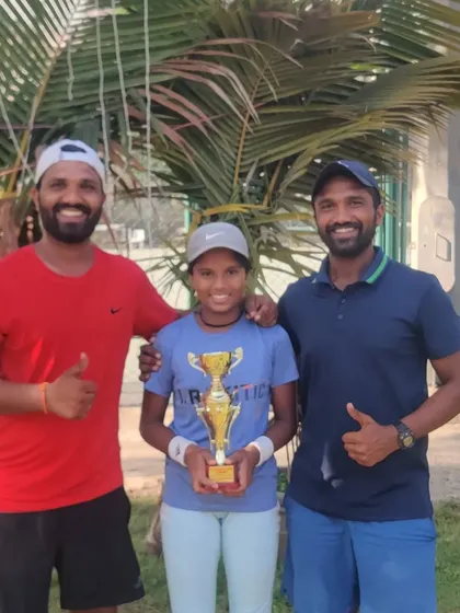 Tamanna Nair with her coaches after her U-12 Doubles Runner-up finish at the National Series in Hyderabad.