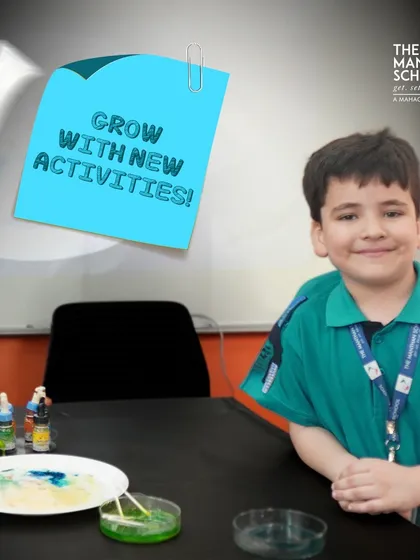 We are always introducing new activities to keep our students engaged and excited about learning. This young scientist is ready to explore a colorful experiment, demonstrating our commitment to dynamic education.