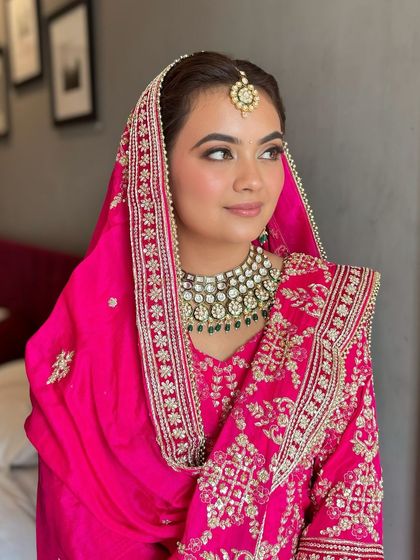 A portrait of my beautiful Anand Karaj bride. The makeup is soft and pretty, letting her joyful expression be the focus.