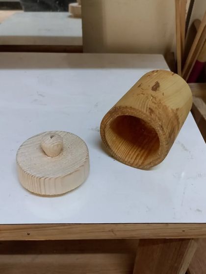 The two parts of the turned box, the main body and the lid. Creating a perfectly fitting lid is one of the key challenges and joys of woodturning.