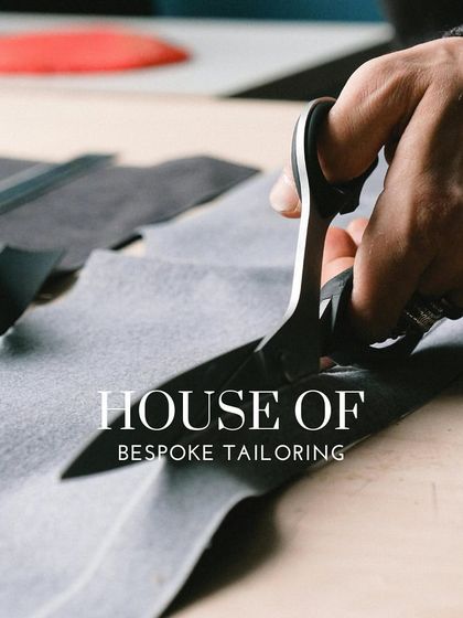 The master cutter's shears in action. This is a critical moment where the two-dimensional fabric begins its transformation into a three-dimensional garment. Precision here is non-negotiable.