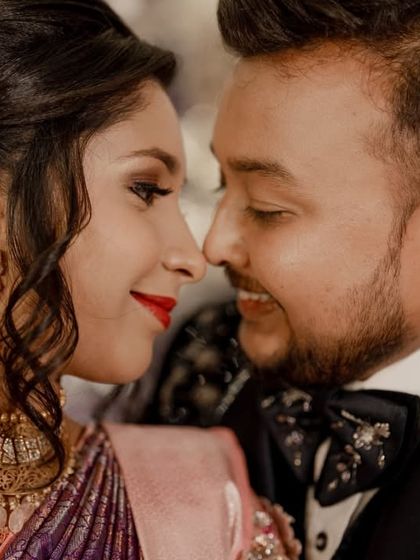 A beautiful close-up of the couple, capturing their smiles and the intimacy of the moment.