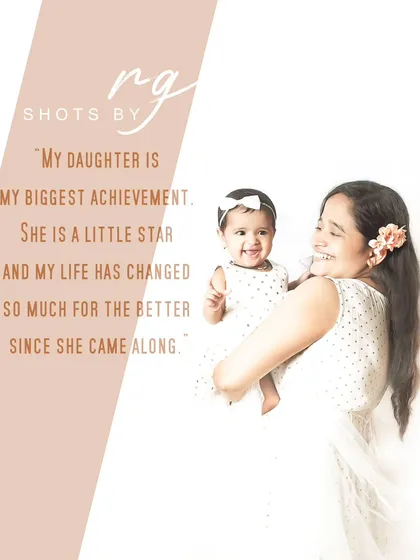 A mother's joy is reflected in her daughter's smile. This portrait captures the pure happiness that a child brings into your life.