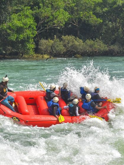 The thrill of hitting a big rapid during our Dandeli river rafting trip.
