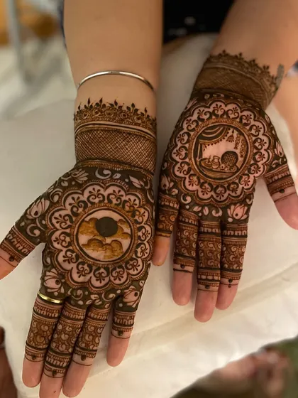 A Karwa Chauth design for a happy client, featuring a central mandala with a cloud and moon motif.
