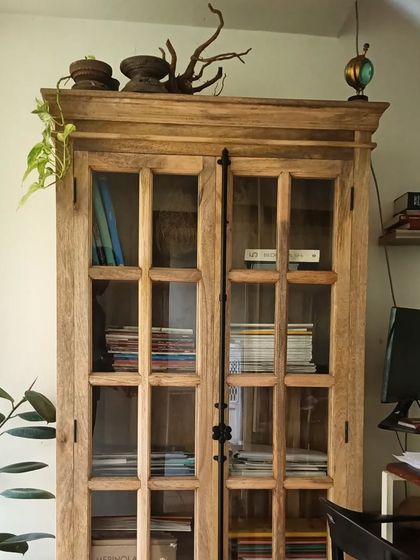 This wooden display cabinet from The Attic adds immense character to the office. It's filled with books, magazines, and natural curiosities that spark ideas.