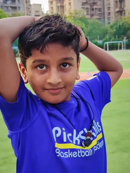 A player posing confidently for the camera. We help kids build self-belief and a positive mindset that they can carry with them everywhere.
